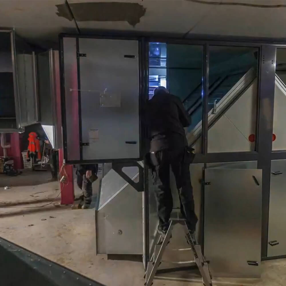 Timelapse replacing air handling system in public swimming hall