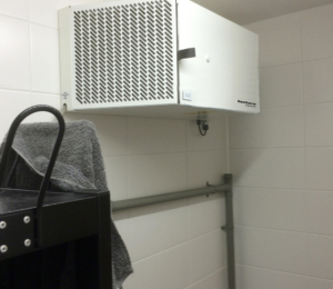 Calorex DH 15 industrial dehumidifier installed in a fire station drying room